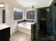 Elegant bathroom with soaking tub and walk-in shower at 8200 Suttonview Dr, Charlotte, NC 28269