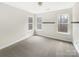 Spacious bedroom with carpet and dual windows at 8200 Suttonview Dr, Charlotte, NC 28269