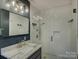 Modern bathroom with subway tile shower and a floating vanity at 860 Nightingale Rd, Rock Hill, SC 29732