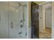 Updated bathroom with a shower and a modern door at 860 Nightingale Rd, Rock Hill, SC 29732