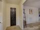 Bright entryway with dark door and light flooring at 860 Nightingale Rd, Rock Hill, SC 29732