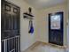 Bright entryway with coat rack and access to staircase at 860 Nightingale Rd, Rock Hill, SC 29732