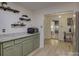 Kitchen features marble countertops and floating shelves at 860 Nightingale Rd, Rock Hill, SC 29732