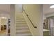 Modern staircase with a sleek metal railing at 860 Nightingale Rd, Rock Hill, SC 29732