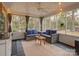 Relaxing sunroom with wicker furniture and ceiling fan at 860 Nightingale Rd, Rock Hill, SC 29732