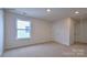 Spacious bedroom with neutral walls and carpet, featuring ample closet space at 866 Two Brothers Ln, York, SC 29745