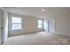 Bright bedroom with carpet and two windows at 866 Two Brothers Ln, York, SC 29745