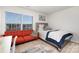 Bedroom with orange couch and full-size bed at 9025 Creedmore Hills Dr, Charlotte, NC 28214