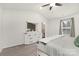 Main bedroom with white dresser and ensuite bathroom access at 9025 Creedmore Hills Dr, Charlotte, NC 28214