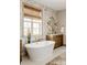 Spa-like bathroom featuring a freestanding tub and marble accents at Lot 1 Mayes Meadow Dr # Devonshire, Cornelius, NC 28078