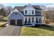 Two story home with gray siding, white accents, and a two car garage at Lot 1 Mayes Meadow Dr # Magnolia, Cornelius, NC 28078