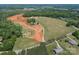 Aerial view of the property showcasing surrounding land and preliminary construction phase at Lot 11 Mayes Meadow Dr # Devonshire, Cornelius, NC 28078
