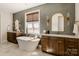 A luxurious bathroom with a soaking tub and dual vanities at Lot 11 Mayes Meadow Dr # Devonshire, Cornelius, NC 28078