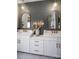 Bright bathroom with dual vanities and decorative tile backsplash at Lot 11 Mayes Meadow Dr # Devonshire, Cornelius, NC 28078