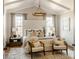 Charming bedroom with vaulted ceiling, stylish decor, and large upholstered headboard at Lot 11 Mayes Meadow Dr # Devonshire, Cornelius, NC 28078