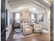 A well-lit primary bedroom with vaulted ceilings and neutral wall colors at Lot 11 Mayes Meadow Dr # Devonshire, Cornelius, NC 28078