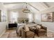 Light-filled bedroom with vaulted ceiling, modern decor, and large windows at Lot 11 Mayes Meadow Dr # Devonshire, Cornelius, NC 28078