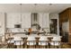 Stylish kitchen island featuring white countertops, ample seating, and modern pendant lighting at Lot 11 Mayes Meadow Dr # Devonshire, Cornelius, NC 28078