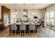 Spacious kitchen with an island, ample seating, and modern lighting fixtures at Lot 11 Mayes Meadow Dr # Devonshire, Cornelius, NC 28078