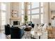 Spacious living room featuring a fireplace, high ceilings, large windows, and stylish decor at Lot 11 Mayes Meadow Dr # Devonshire, Cornelius, NC 28078