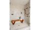 Spacious tile shower featuring a bench and dual shower heads, plus recessed shampoo storage at Lot 11 Mayes Meadow Dr # Devonshire, Cornelius, NC 28078