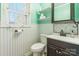 Small bathroom with pedestal sink and wainscoting at 1012 Rawlinson Rd, Rock Hill, SC 29732