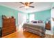 Main bedroom features hardwood floors, ceiling fan, and ample closet space at 1012 Rawlinson Rd, Rock Hill, SC 29732