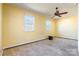 Spacious bedroom with neutral carpeting and ceiling fan at 1012 Rawlinson Rd, Rock Hill, SC 29732