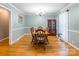 Charming dining room with hardwood floors and a wooden dining set at 1012 Rawlinson Rd, Rock Hill, SC 29732