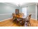 Classic dining room, hardwood floors, and a wood table with chairs at 1012 Rawlinson Rd, Rock Hill, SC 29732