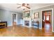 Living room with hardwood floors, fireplace, and built-in shelving at 1012 Rawlinson Rd, Rock Hill, SC 29732