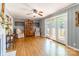 Living room with hardwood floors, French doors, and a view of the backyard at 1012 Rawlinson Rd, Rock Hill, SC 29732