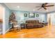 Relaxing living room with hardwood floors and a ceiling fan at 1012 Rawlinson Rd, Rock Hill, SC 29732