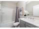 The bathroom features a shower/tub combination and a sink vanity with a large mirror at 10149 Elizabeth Crest Ln, Charlotte, NC 28277