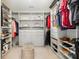 Well-organized walk-in closet with custom shelving and ample storage space at 10149 Elizabeth Crest Ln, Charlotte, NC 28277