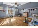 Bright bedroom with hardwood floors, window, and neutral gray walls at 108 Three Oaks Ln, Kings Mountain, NC 28086