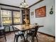 Charming dining area with a rustic table and chairs, set with modern decor at 108 Three Oaks Ln, Kings Mountain, NC 28086