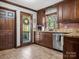 Kitchen with stainless steel appliances, granite countertops and access to the back deck at 108 Three Oaks Ln, Kings Mountain, NC 28086