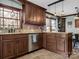 Updated kitchen featuring granite counters, tile backsplash, and stainless steel appliances at 108 Three Oaks Ln, Kings Mountain, NC 28086