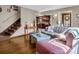 Comfortable living room with wooden floors and a staircase at 108 Three Oaks Ln, Kings Mountain, NC 28086