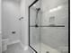 Large walk-in shower with marble tile in modern bathroom at 1122 Pegram Crossing Dr, Charlotte, NC 28205