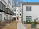 Shared walkway between townhomes showcasing building exteriors at 1122 Pegram Crossing Dr, Charlotte, NC 28205