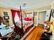 Spacious bedroom with hardwood floors and four poster bed at 12 Maple St, Great Falls, SC 29055