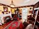 Living room with fireplace and view into kitchen at 12 Maple St, Great Falls, SC 29055