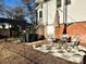 Small patio with table, chairs, umbrella, and grill at 12 Maple St, Great Falls, SC 29055