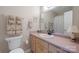 Clean bathroom with pink vanity and shower/tub combo at 125 1St N Ave, Conover, NC 28613