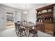 Dining room with wooden table, chairs, and a hutch at 125 1St N Ave, Conover, NC 28613