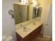 Bathroom with double vanity and mirror at 130 Swift Creek Ln, Mooresville, NC 28115