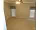 Spacious bedroom with carpet and door to patio at 130 Swift Creek Ln, Mooresville, NC 28115