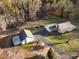 Aerial view of house and detached garage on large lot at 1360 Hopewell Church Rd, Catawba, NC 28609